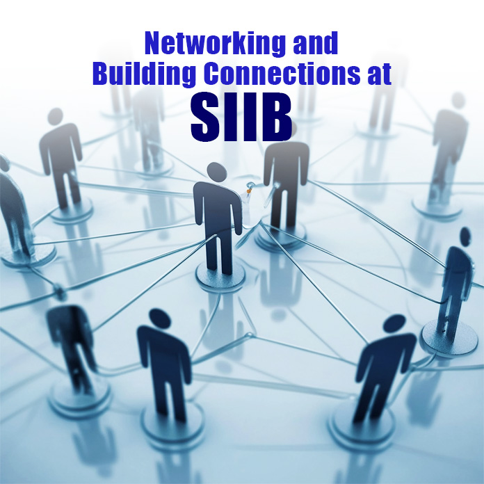 Students at SIIB Pune engaging in networking activities, building connections with peers, alumni, and industry professionals for career growth.